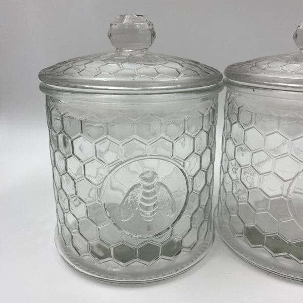 honeycomb canister with honey bee on front clear embossed glass one of three