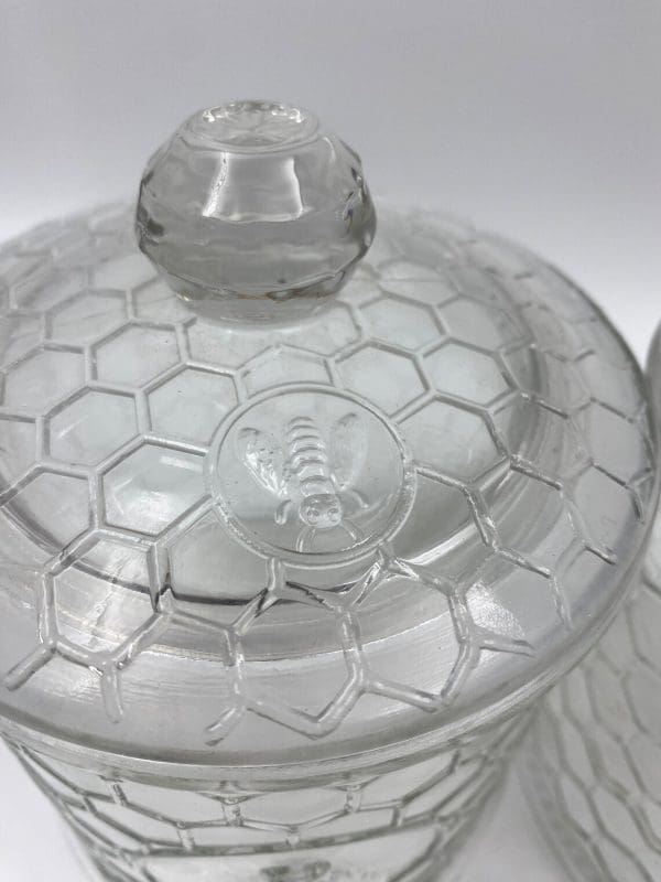 honeycomb canister with honey bee on front clear embossed glass honey bee on cover