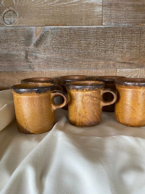 McCoy coffee mugs close to texture