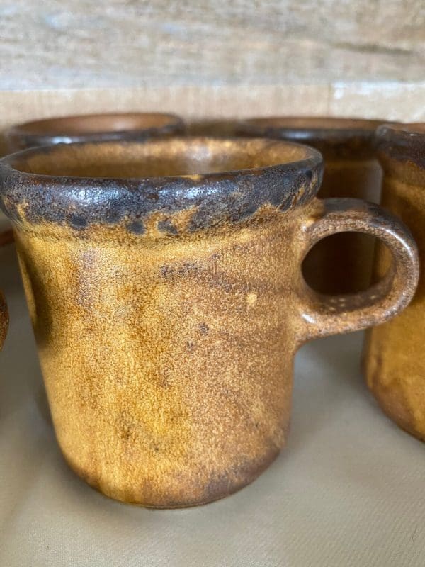 McCoy coffee mugs close brown glaze texture