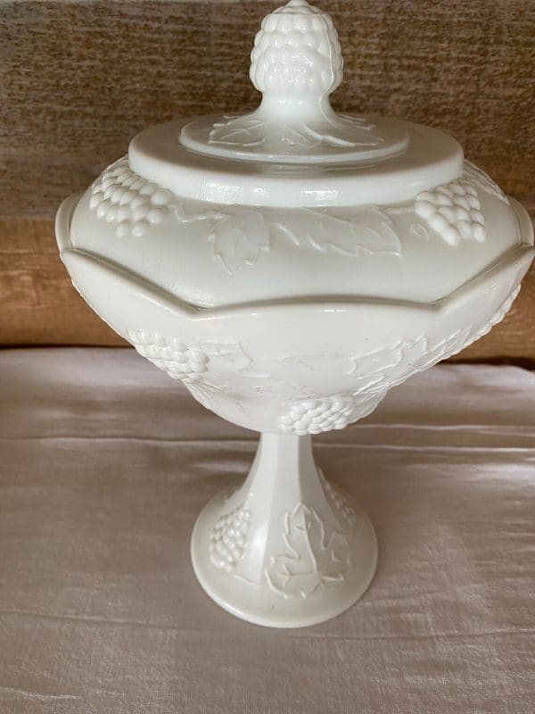 milk glass candy dish with grapes close