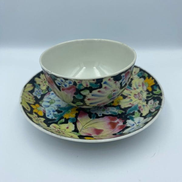 black tea cups and saucer