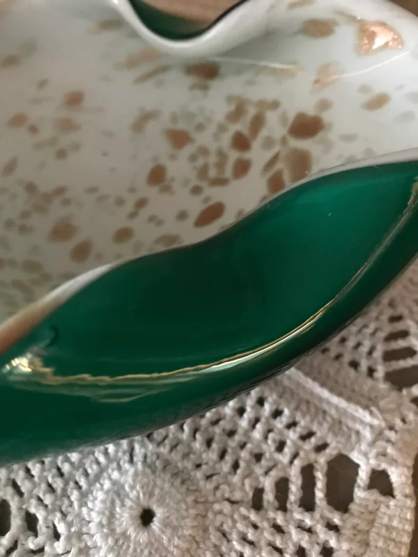 Green Murano glass with white and gold inside green