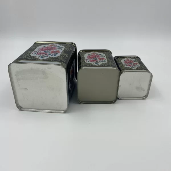 tin canister set vintage bottoms