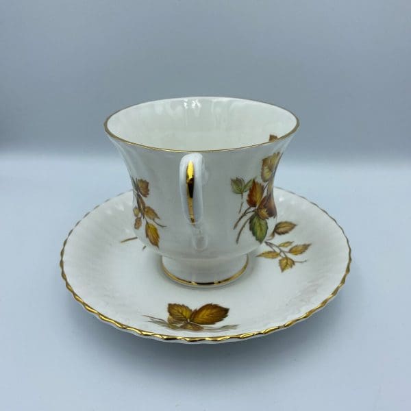 vintage paragon tea cup and saucer gold trim handle