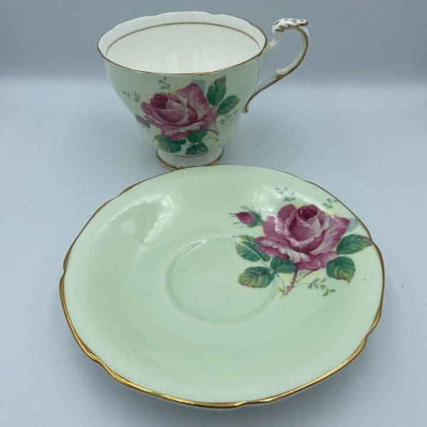 Paragon cabbage rose teacup saucer mint green background