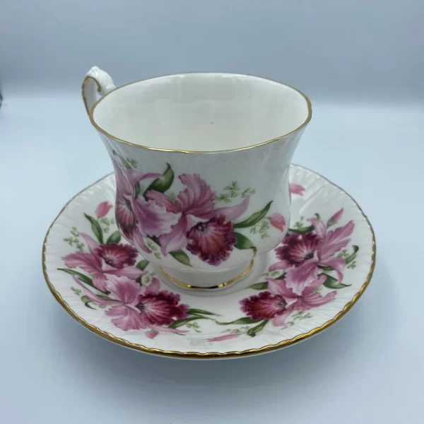 Paragon tea cup and saucer handle in back