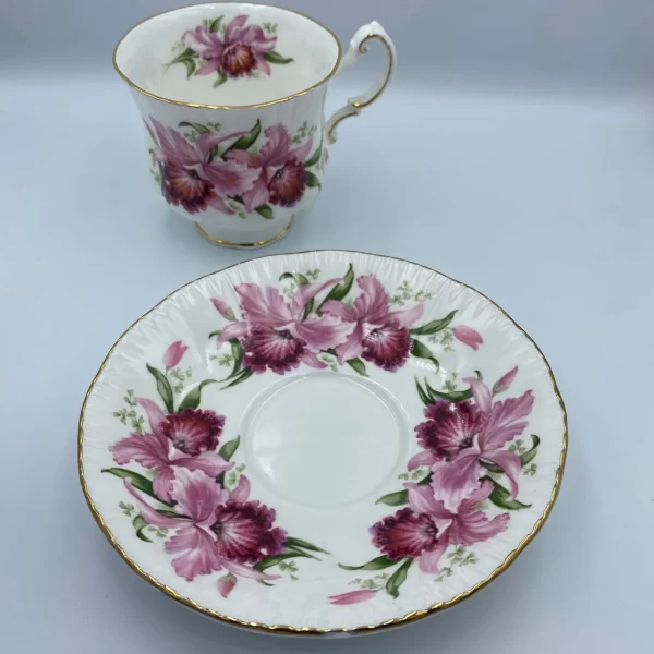 Paragon tea cup and saucer gold trim with pink orchid flowers