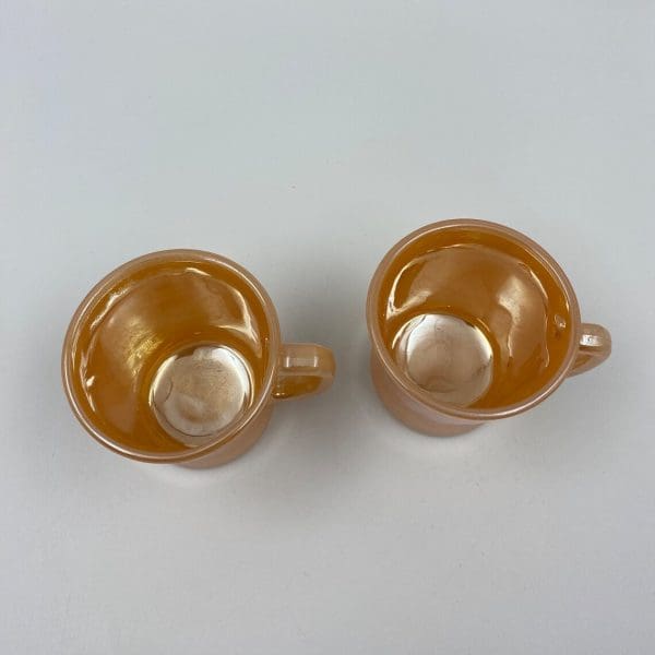 Peach Lustre Fire King Mugs tops