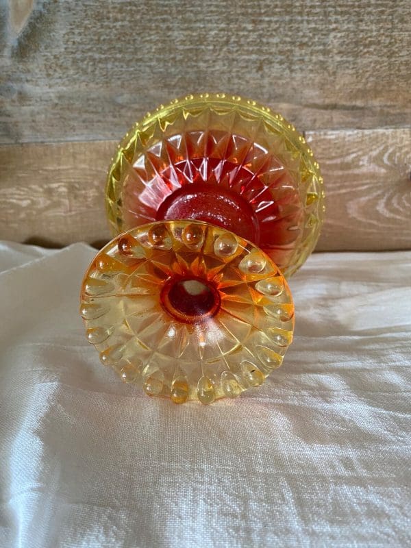 red and yellow glass candy dish yellow bottom