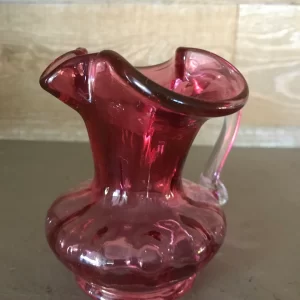 pink glass creamer front