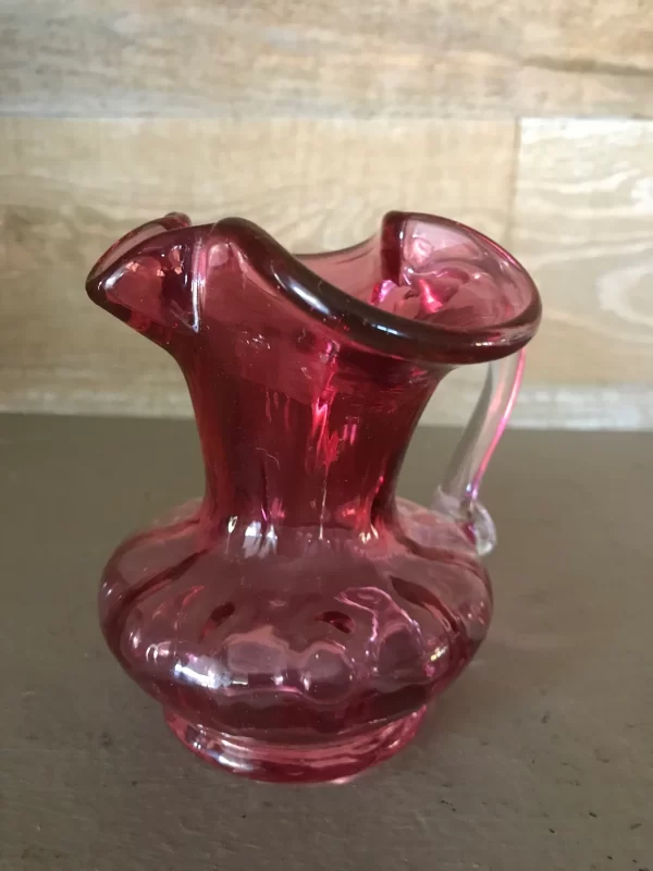 pink glass creamer front