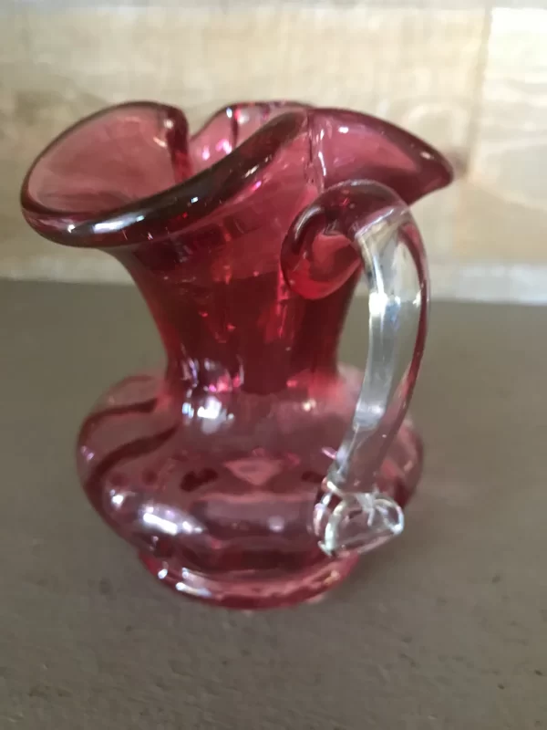 pink glass creamer handle