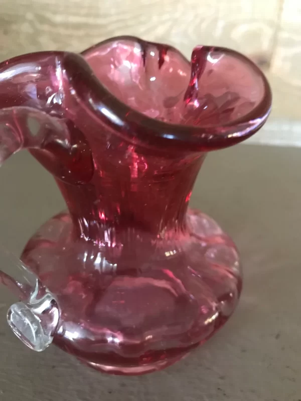 pink glass creamer hand blowen