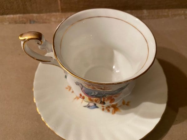 bird tea cup Queens Blue Jay top