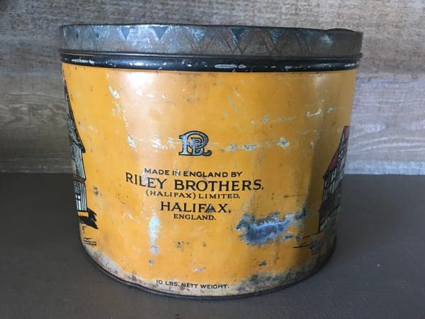 Rileys toffee tin side showing makers mark