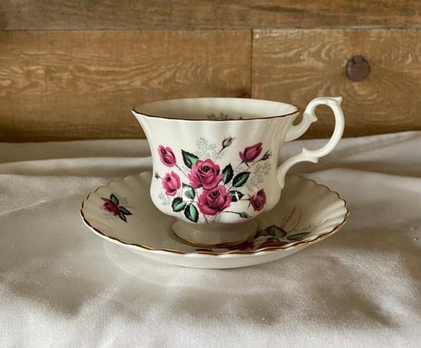 Royal Albert Montrose shape tea cup and saucer deep pink roses right side