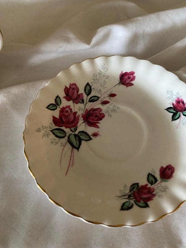 Royal Albert Montrose shape tea cup and saucer deep pink roses saucer top