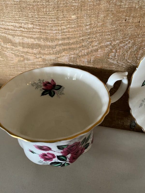 Royal Albert Montrose shape tea cup and saucer deep pink roses tea cup edge gold trim