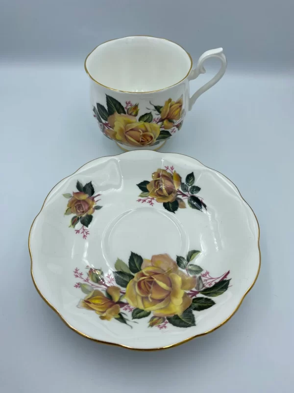 royal albert tea cups and saucers separate yellow roses on both