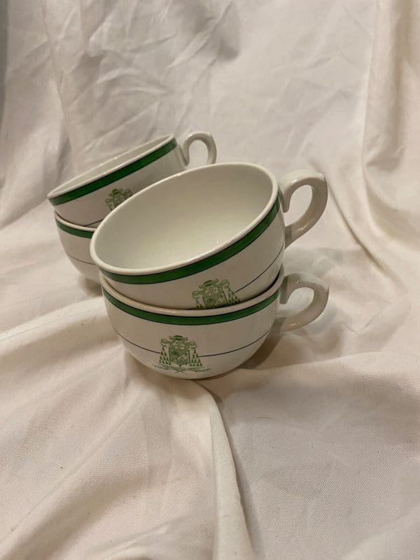 Royal Doulton Tea Cups White and Green with Crest on Front stacked