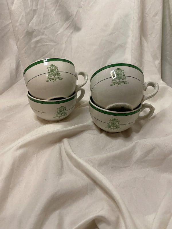 Royal Doulton Tea Cups White and Green with Crest on Front fronts