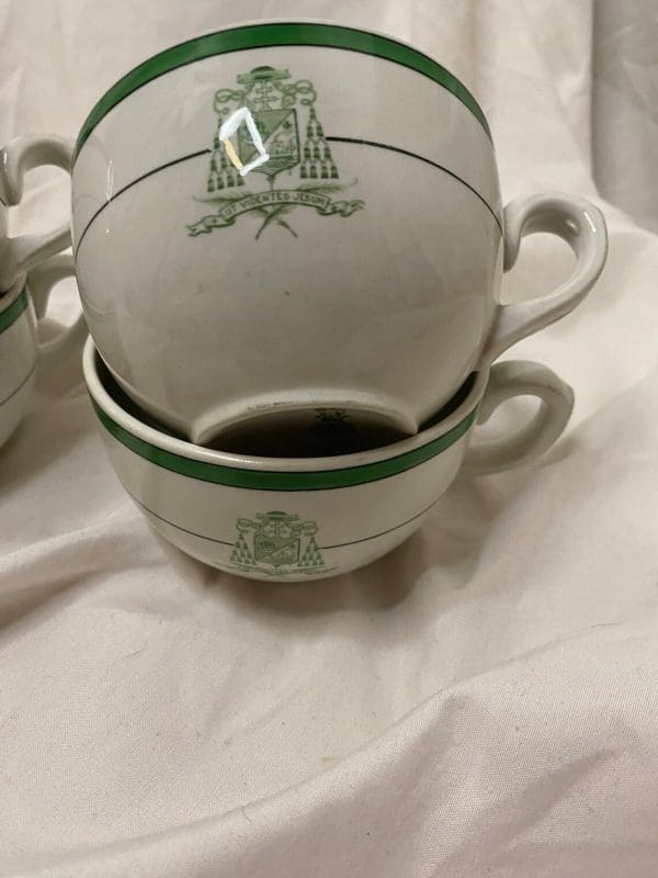 Royal Doulton Tea Cups White and Green with Crest on Front close of two