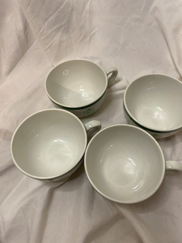 Royal Doulton Tea Cups White and Green with Crest on Front tops