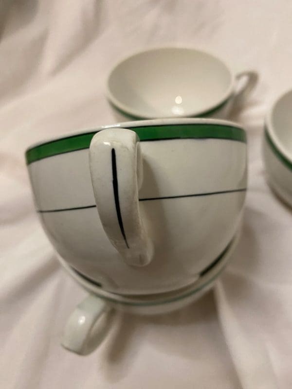 Royal Doulton Tea Cups White and Green with Crest on Front handle