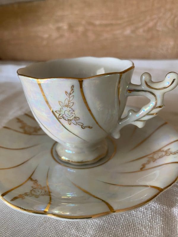 demitasse tea cups gold flower design on white