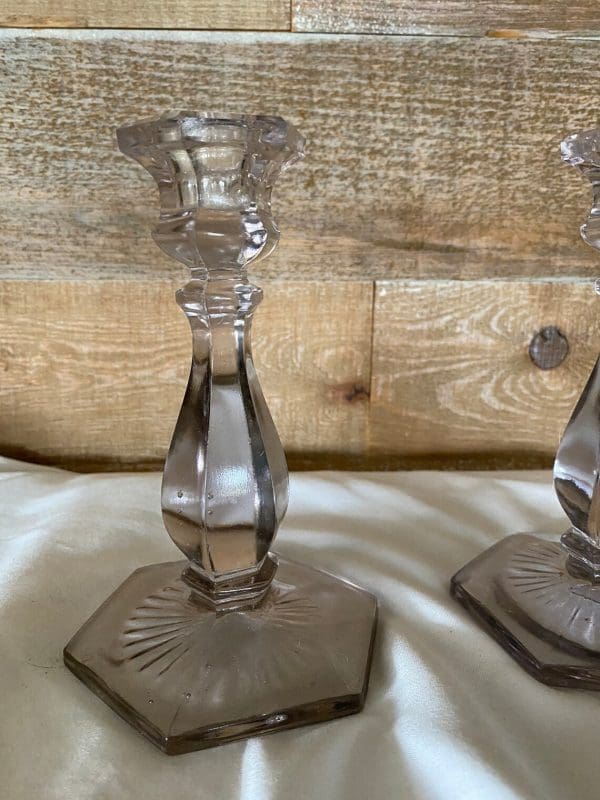 vintage glass candle holders close to show purple tint