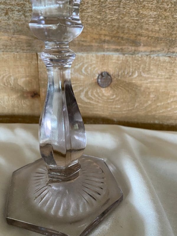 vintage glass candle holders close to show column