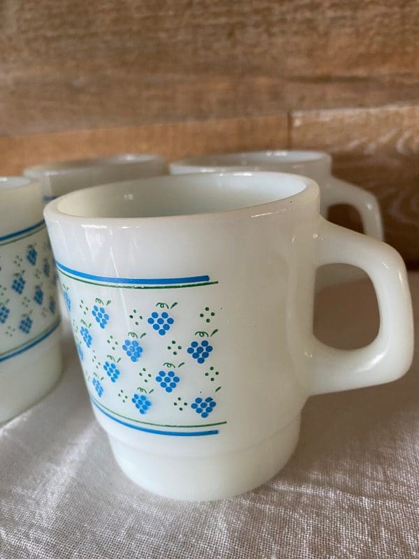 Termocrisa Mugs Set of Four Blue Grape Pattern close vibrant color on white milk glass