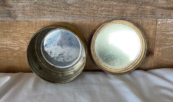 tobacco tins vintage Troost Special Cavendish round can on side showing inside and backside of tin and cover