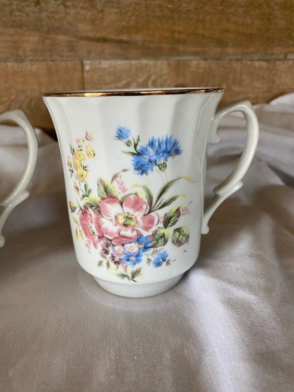 vintage white coffee mugs with floral design right mug