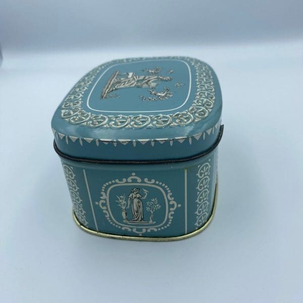 vintage candy tin Greek embossed design left side