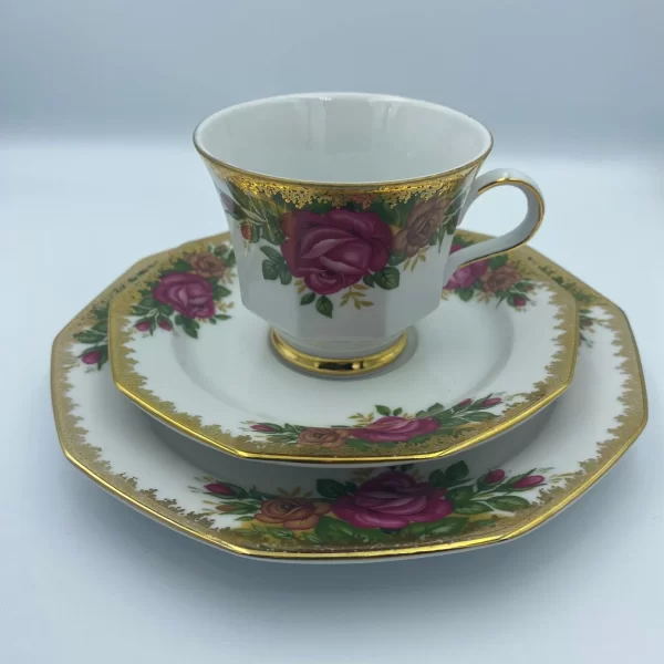 Winterling Bavaria Germany tea cup and saucer rose heavy gold trio front