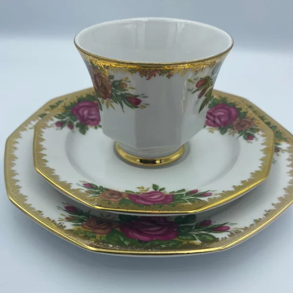 Winterling Bavaria Germany tea cup and saucer rose heavy gold trim