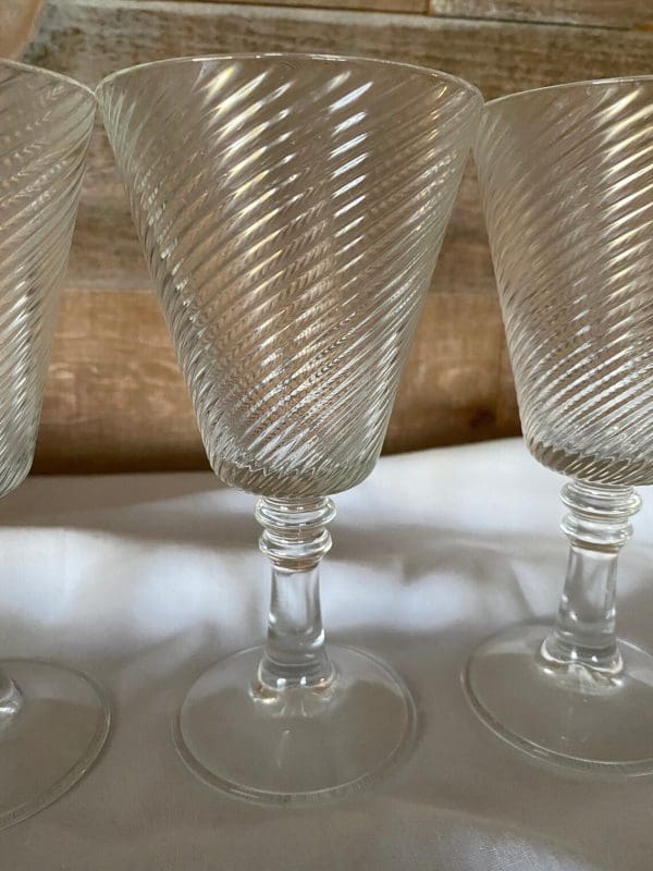 Italian wine glasses close to second of three