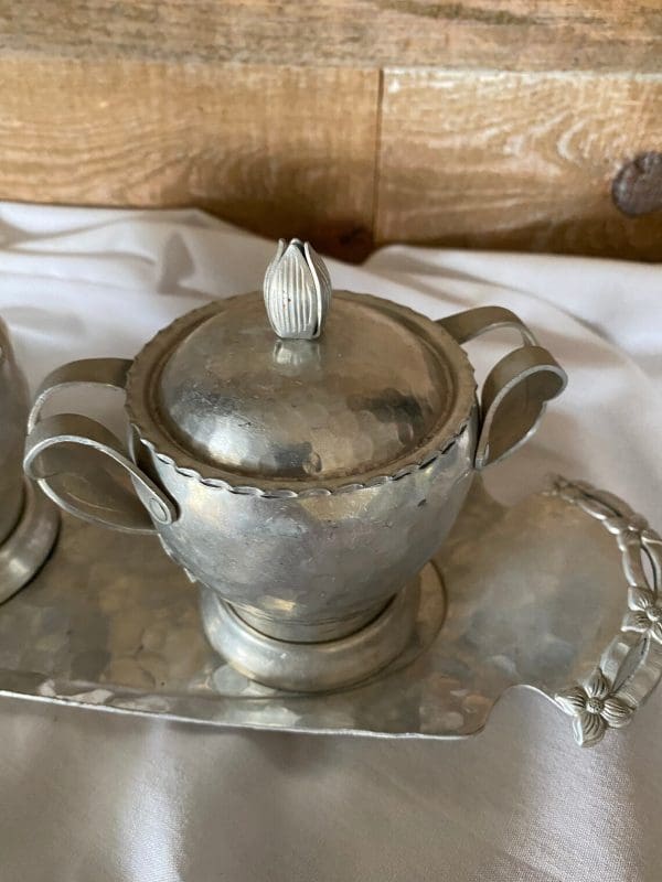 vintage creamer and sugar set metal on tray top of sugar dish