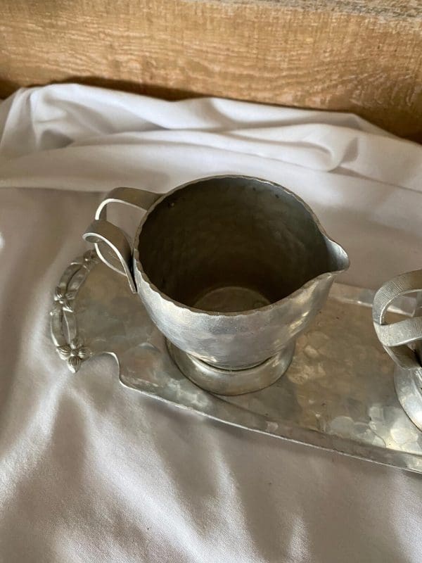 vintage creamer and sugar set metal on tray top of creamer