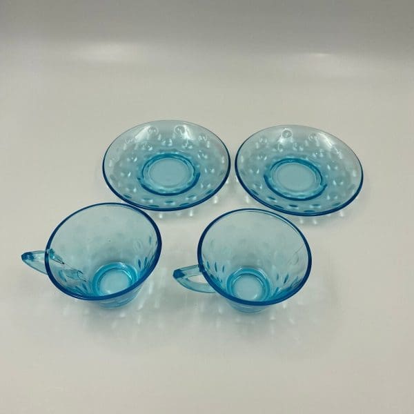 blue glass tea cups atomic style handles