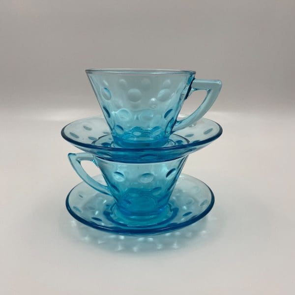 blue glass tea cups with saucers stacked set of two