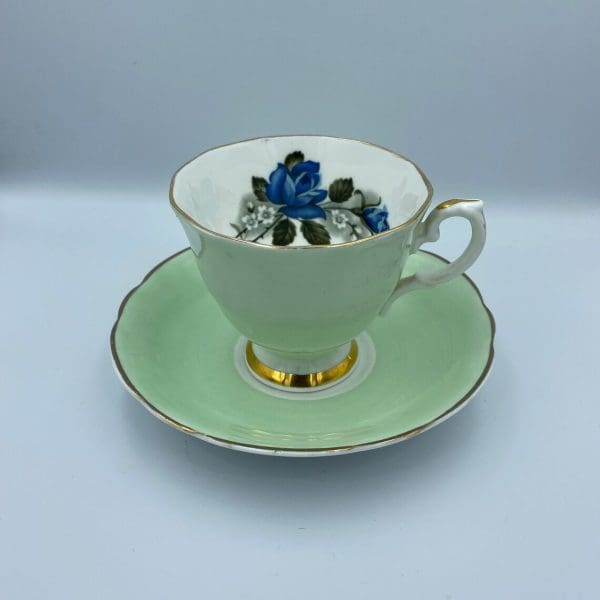 Consort teacup light green with Blue Rose inside