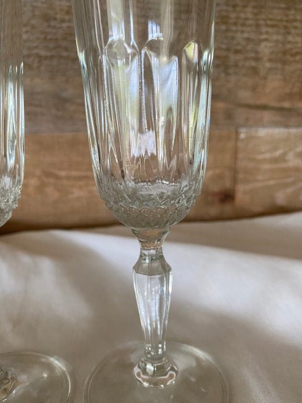 cut glass champagne flutes close to show cut glass detail