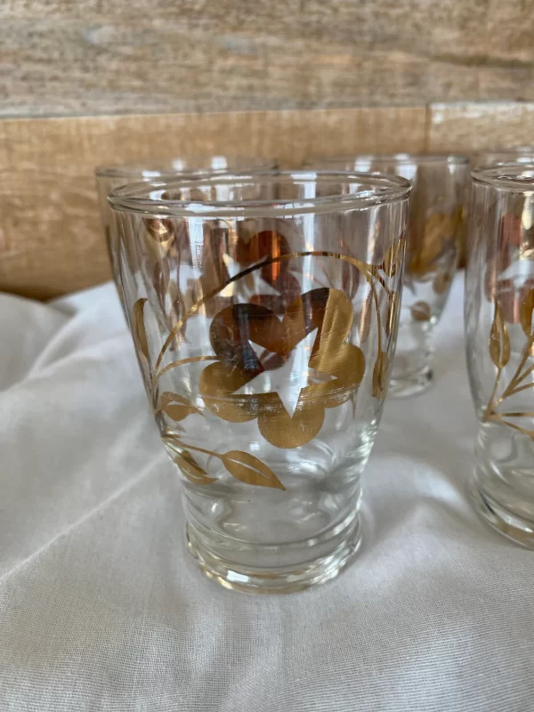 vintage juice glasses gold flower design star center flowers