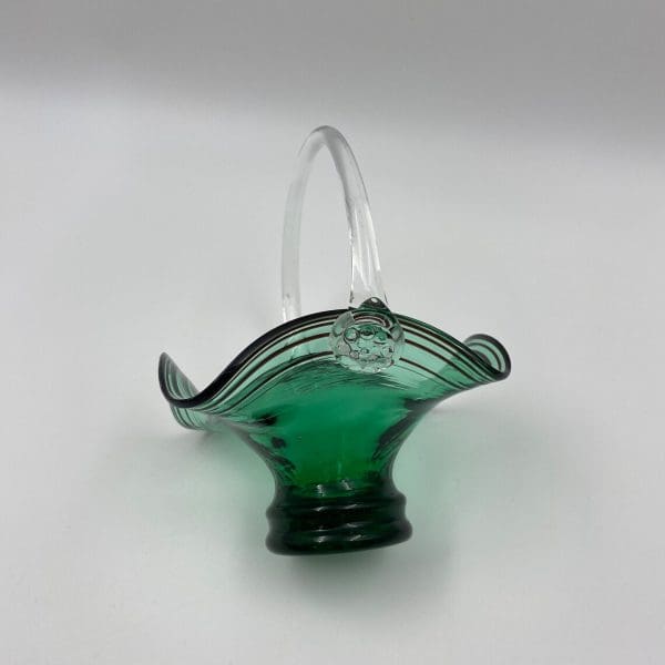 vintage green glass basket with handle on side