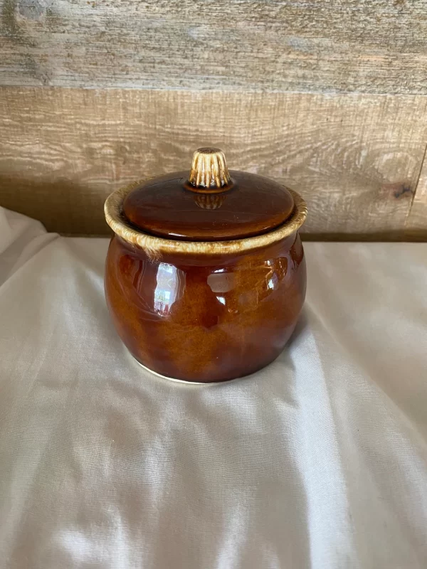 Hull brown drip pottery jar with cover