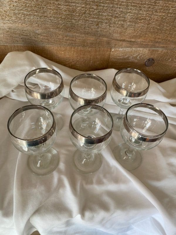 silver rimmed wine glasses top view