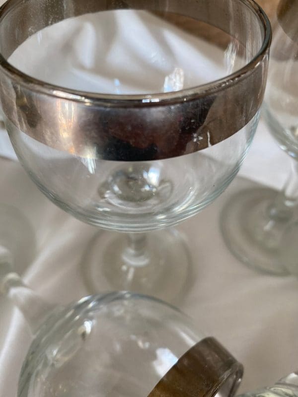 silver rimmed wine glasses close view